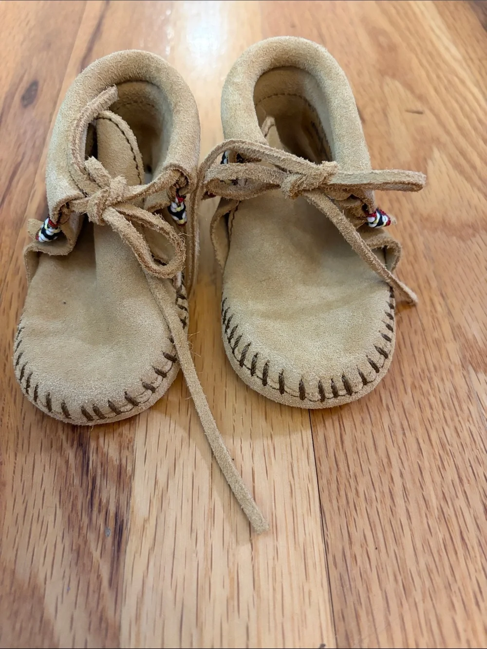Minnetonka Kids Suede Moccasins in Tan